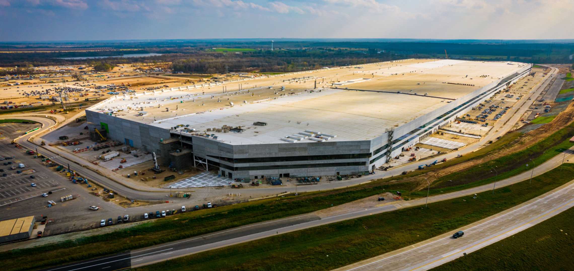 Tesla's 700M factory, Rainey tower cash, public housing opens up Urbanize Austin