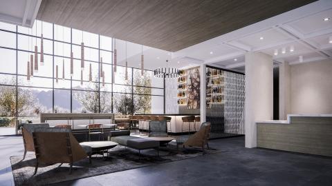 Rendering of a large, high-ceilinged, contemporary hotel lobby with a wall full of windows looking out onto hills.