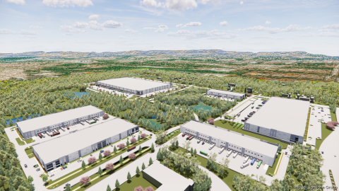 Rendering of a sprawling industrial warehouse project surrounded by green flatlands with hills in the distance.